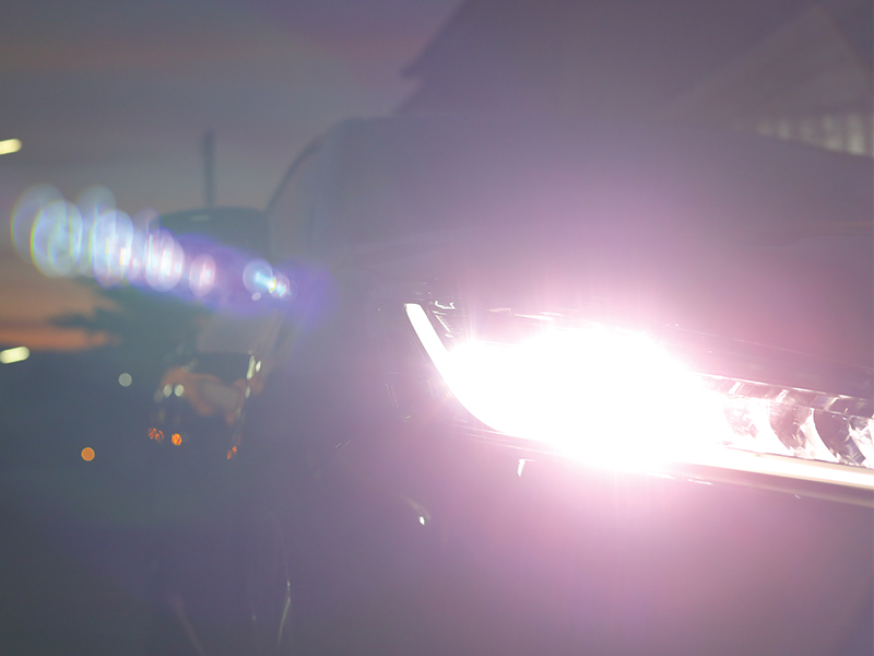 headlight vehicle car open high light beam in the night road